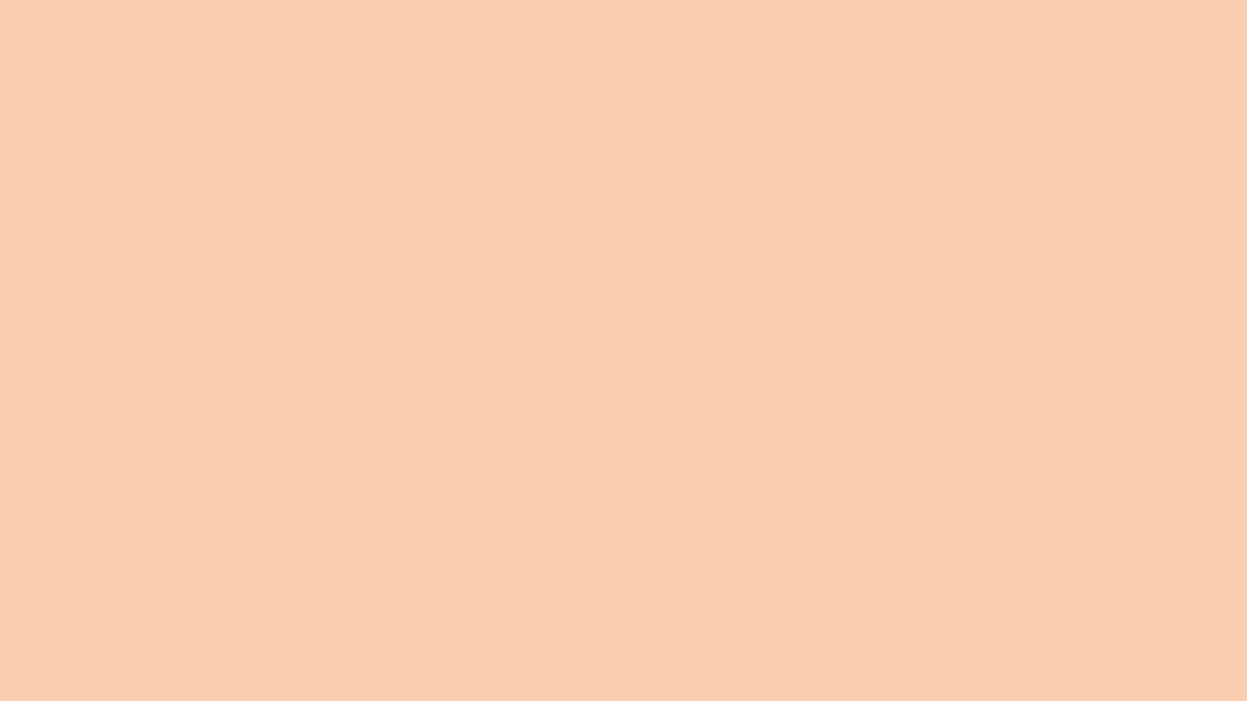 Solid apricot background 2560x1440, hex #FBCEB1